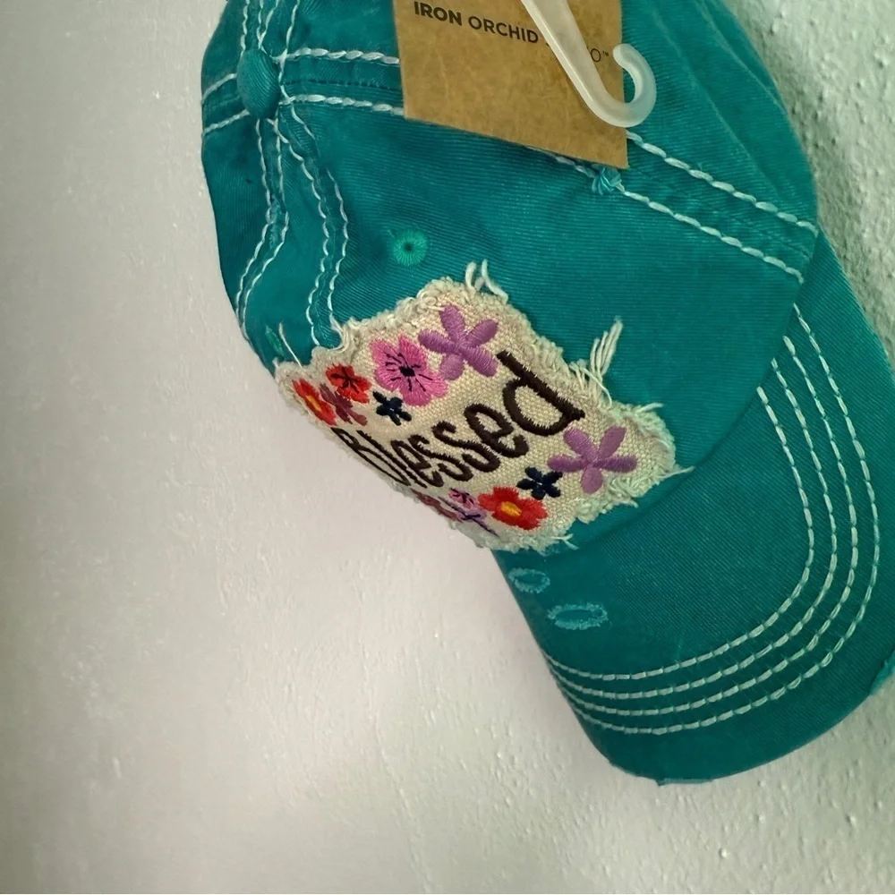 Iron Orchid Studio teal cap
